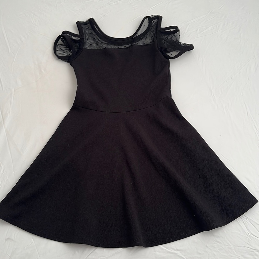 Couture black fit and flare Swiss dot mesh neckline and cold shoulder sleeves